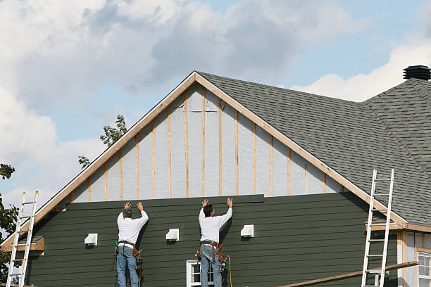 Professional Siding technician working in Colchester, CT